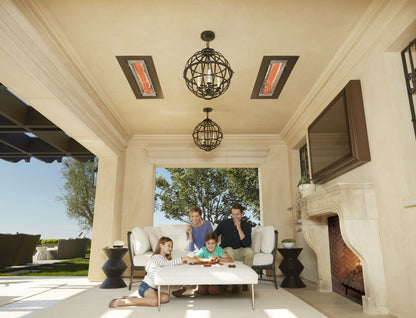 a family enjoying a luxury terrace heated by two recessed infratech heaters