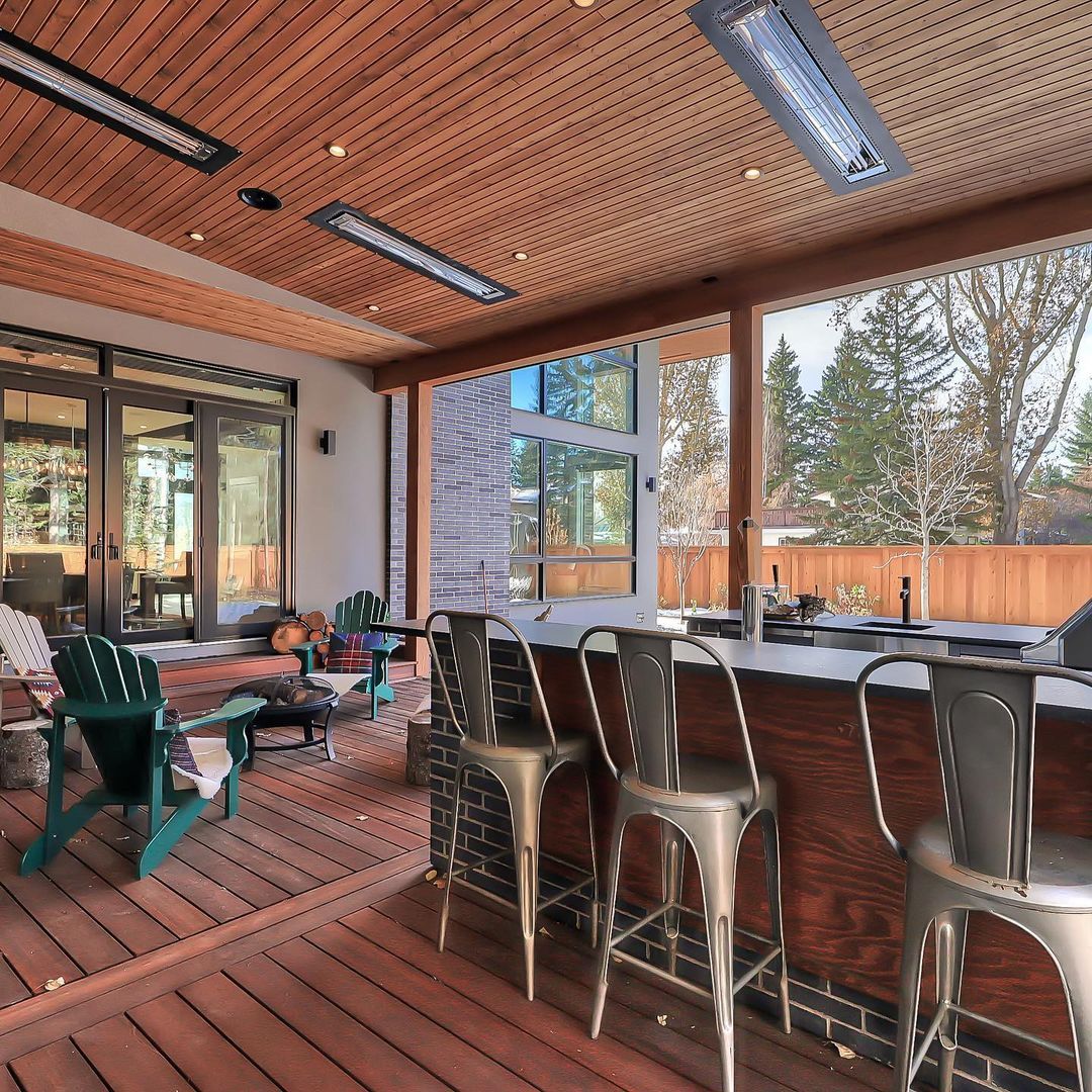 terrace with a wooden ceiling showcasing black recessed infratech heater
